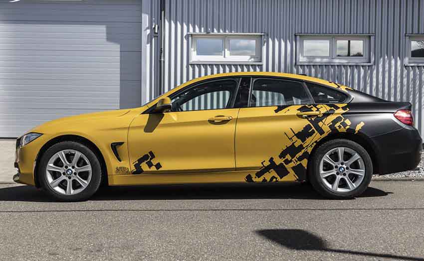 dán decal tem trùm hoạ tiết cho ô tô